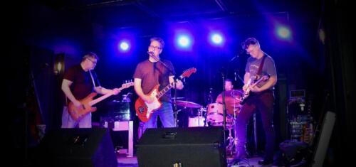 Exploding the Moments live on stage